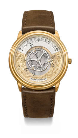 AUDEMARS PIGUET. AN ATTRACTIVE AND UNUSUAL 18K GOLD AUTOMATIC WANDERING HOUR WRISTWATCH - фото 1