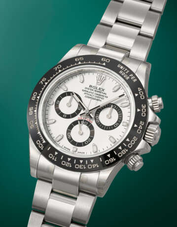 ROLEX. A COVETED AND SPORTY STAINLESS STEEL AUTOMATIC CHRONOGRAPH WRISTWATCH WITH BRACELET - photo 2