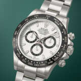 ROLEX. A COVETED AND SPORTY STAINLESS STEEL AUTOMATIC CHRONOGRAPH WRISTWATCH WITH BRACELET - photo 2