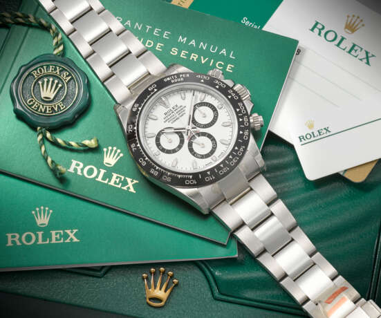 ROLEX. A COVETED AND SPORTY STAINLESS STEEL AUTOMATIC CHRONOGRAPH WRISTWATCH WITH BRACELET - photo 3