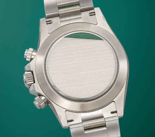 ROLEX. A COVETED AND SPORTY STAINLESS STEEL AUTOMATIC CHRONOGRAPH WRISTWATCH WITH BRACELET - photo 4