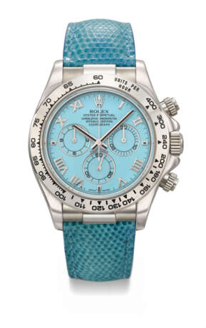 ROLEX. A RARE AND VIBRANT 18K WHITE GOLD AUTOMATIC CHRONOGRAPH WRISTWATCH WITH TURQUOISE DIAL - photo 1