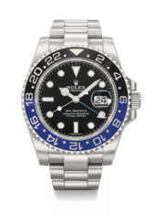 ROLEX. A STAINLESS STEEL DUAL TIME WRISTWATCH WITH SWEEP CENTRE SECONDS, DATE AND BRACELET