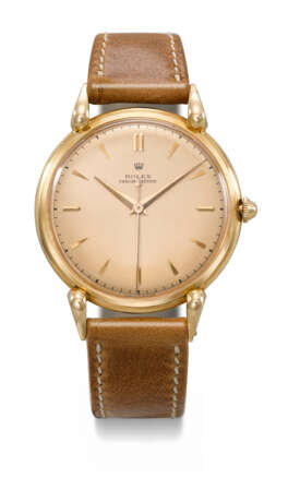 ROLEX. AN EXTREMELY RARE AND UNUSUAL 18K PINK GOLD WRISTWATCH WITH FANCY LUGS AND PINK DIAL - photo 1