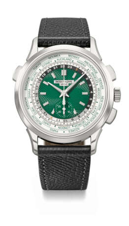 PATEK PHILIPPE. A RARE AND VIBRANT PLATINUM AUTOMATIC FLYBACK CHRONOGRAPH WORLD TIME WRISTWATCH - photo 1