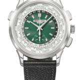 PATEK PHILIPPE. A RARE AND VIBRANT PLATINUM AUTOMATIC FLYBACK CHRONOGRAPH WORLD TIME WRISTWATCH - photo 1