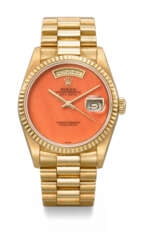 ROLEX. A VERY RARE AND HIGHLY ATTRACTIVE 18K GOLD AUTOMATIC WRISTWATCH WITH SWEEP CENTRE SECONDS, DAY, DATE, CORAL DIAL AND BRACELET