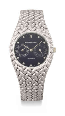 AUDEMARS PIGUET. A VERY RARE 18K WHITE GOLD AND DIAMOND-SET AUTOMATIC BRACELET WATCH WITH DAY AND DATE - фото 1