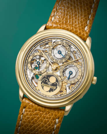 AUDEMARS PIGUET. A RARE AND ELEGANT 18K GOLD AUTOMATIC SKELETONIZED PERPETUAL CALENDAR WRISTWATCH WITH MOON PHASES - фото 2