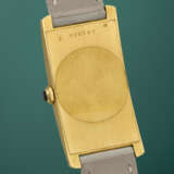 CARTIER. AN EXTREMELY RARE, ELEGANT AND LARGE RECTANGULAR CURVED 18K GOLD WRISTWATCH - photo 3