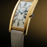 CARTIER. AN EXTREMELY RARE, ELEGANT AND LARGE RECTANGULAR CURVED 18K GOLD WRISTWATCH - photo 6