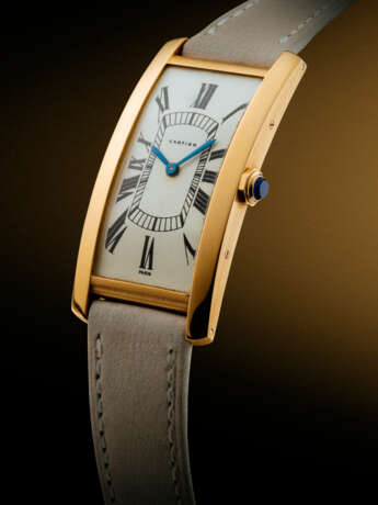 CARTIER. AN EXTREMELY RARE, ELEGANT AND LARGE RECTANGULAR CURVED 18K GOLD WRISTWATCH - photo 6