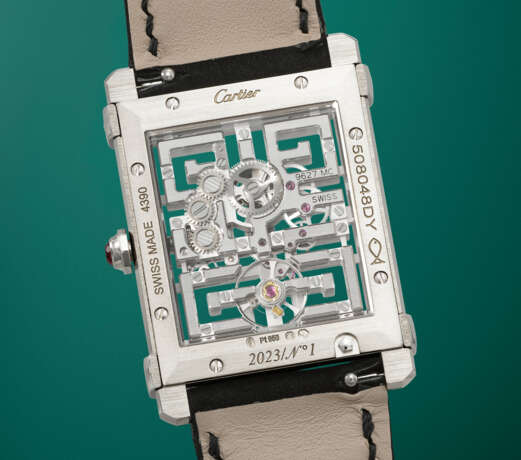 CARTIER. A POSSIBLY UNIQUE AND DISTINGUISHED PLATINUM SKELETONIZED WRISTWATCH - photo 4