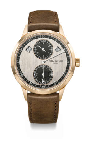 PATEK PHILIPPE. AN ATTRACTIVE 18K PINK GOLD AUTOMATIC ANNUAL CALENDAR WRISTWATCH WITH REGULATOR-STYLE DIAL - photo 1