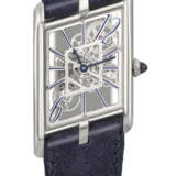 CARTIER. A VERY RARE AND UNUSUAL PLATINUM LIMITED EDITION SKELETONIZED ASYMETRICAL WRISTWATCH - photo 1