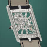 CARTIER. A VERY RARE AND UNUSUAL PLATINUM LIMITED EDITION SKELETONIZED ASYMETRICAL WRISTWATCH - photo 4