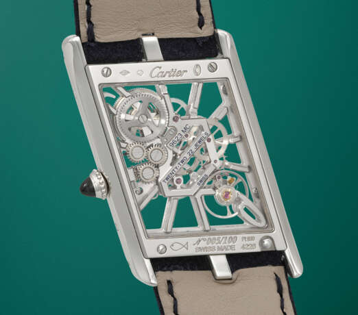 CARTIER. A VERY RARE AND UNUSUAL PLATINUM LIMITED EDITION SKELETONIZED ASYMETRICAL WRISTWATCH - photo 4