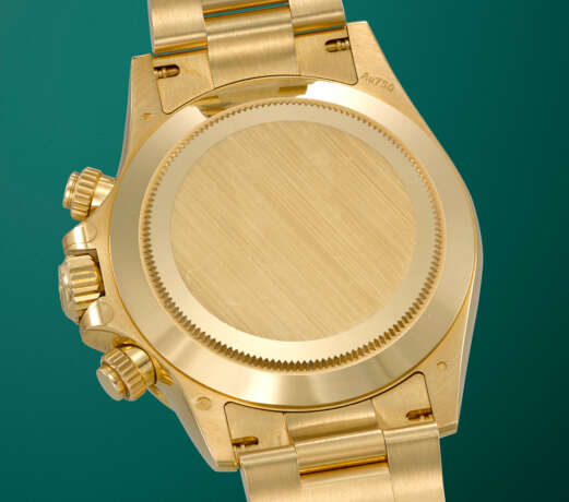 ROLEX. AN ATTRACTIVE AND COVETED 18K GOLD AUTOMATIC CHRONOGRAPH WRISTWATCH WITH BRACELET - photo 4