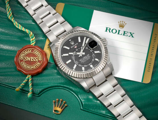 ROLEX. AN ATTRACTIVE STAINLESS STEEL AND 18K WHITE GOLD AUTOMATIC ANNUAL CALENDAR DUAL TIME WRISTWATCH WITH SWEEP CENTRE SECONDS AND BRACELET - photo 3