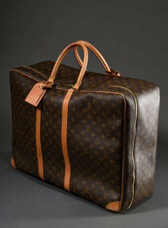 Louis Vuitton "Sirius 55" Reisetasche in Monogram Canvas mit messingfarbenem Zwei-Wege-Reißverschluss, hellem Rindsleder Besatz und Adressanhänger, innen helles Baumwollfutter mit Spanngurt und Einsteckfach, Nr… - Foto 3