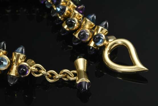 Tamara Comolli "Mikado" Gelbgold 750 Armband mit kegelförmigen Topas- und Amethystcabochons in violett und türkis Tönen, herzförmiger Knebelverschluss, sign., 90,5g, L. 22,5cm, leichte Tragespuren - фото 4