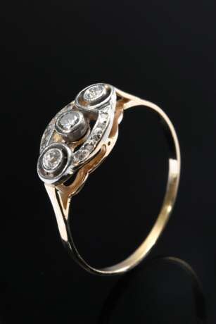 Zarter Gelbgold 585 Ring mit platinierter Oberfläche und mittig eingefassten Diamanten (zus. ca. 0.13ct/P1/W-CR), um 1920, 1,6g, Gr. 57, kleine Reparaturstelle - photo 1