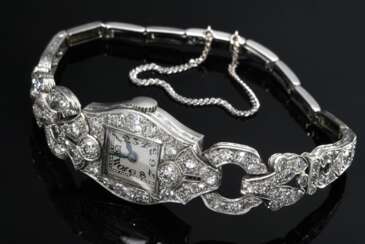 Art Deco Platin Armbanduhr mit Diamanten im Alt- und Achtkantschliff (zus. ca. 3.20ct/SI-P1/W-CR), Handaufzug, 23,7g, L. 18,4cm, Zugband defekt, Steg lose, keine Garantie auf Werk und Funktionalität