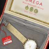 Omega Gelbgold 585 Armbanduhr mit Automatikwerk, Mineralglas, Minuten- und Stundenstrich Indizes, Armband nicht original, Schweiz um 1960, Original Box, Kasten und Garantiekarte (teilweise defekt), 56g, L. 19,5cm, Ø 3,1c… - Foto 7