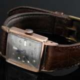 Rotgold 585 Armbanduhr "Hilton Watch", Handaufzug, weiße Imitatsteine, gebläute Zeiger, kleine Sekunde, Minuten Indizes, braunes Lederarmband mit vergoldeter Dornschließe, um 1940, 3,6x2,1cm, gangbar (keine Gar… - photo 1