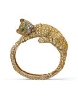 RARE RENÉ BOIVIN COLOURED DIAMOND, DIAMOND AND EMERALD 'LIONNE' BANGLE/BROOCH
