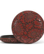 Song dynasty. A CARVED TRICOLOUR LACQUER ‘CHRYSANTHEMUM’ BOX AND COVER