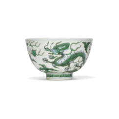 A VERY RARE UNDERGLAZE BLUE AND GREEN-ENAMELLED ‘DRAGON’ BOWL