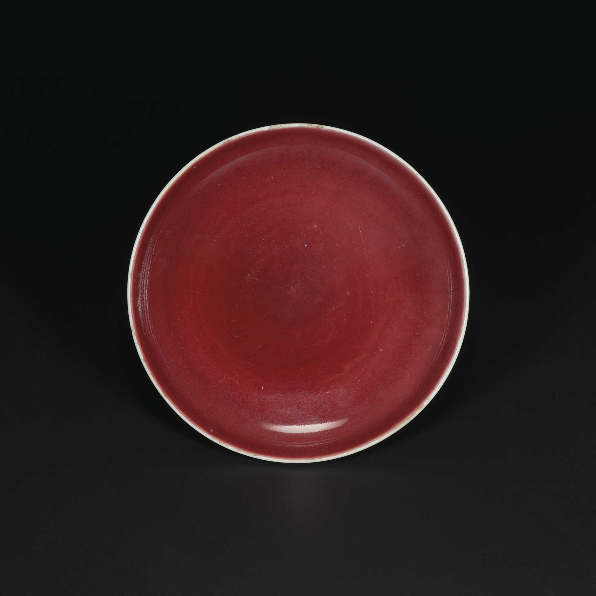 A COPPER-RED-GLAZED DISH