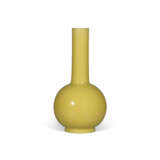 A YELLOW GLASS BOTTLE VASE - photo 1