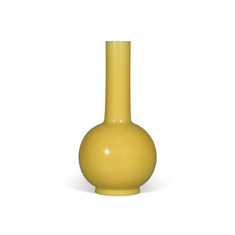 A YELLOW GLASS BOTTLE VASE - photo 1