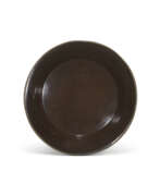 Plastic. A BLACK LACQUER DISH