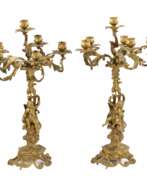 Подсвечники. Pair of gilded bronze candelabra. 19th century