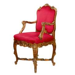 Magnificent, carved chair in the Rococo style of the 19th-20th centuries.