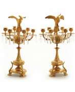 Подсвечники. Pair of candelabra with figures of birds of paradise.