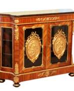 Storage furniture. Large chest of drawers in Louis XVI style. The end of the 19th century.