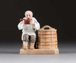 A BISCUIT PORCELAIN FIGURE OF A RUSSIAN PEASANT