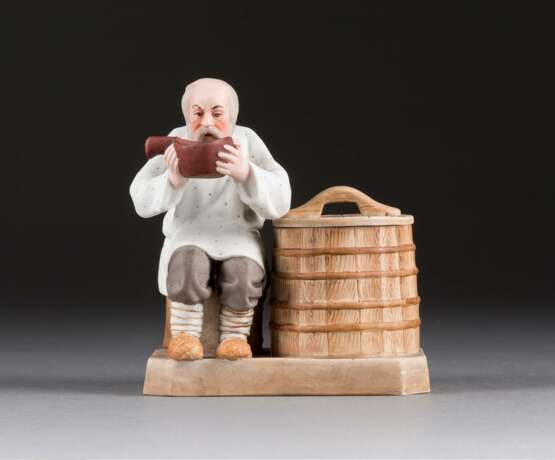 A BISCUIT PORCELAIN FIGURE OF A RUSSIAN PEASANT - фото 1