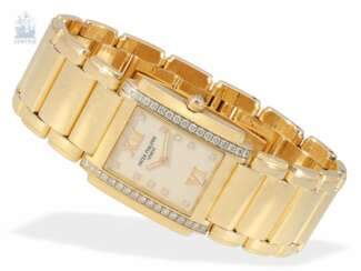 Armbanduhr: äußerst luxuriöse Patek Philippe "Twenty~4" Damenuhr in Vollgold mit Brillantbesatz, REF 4910/11