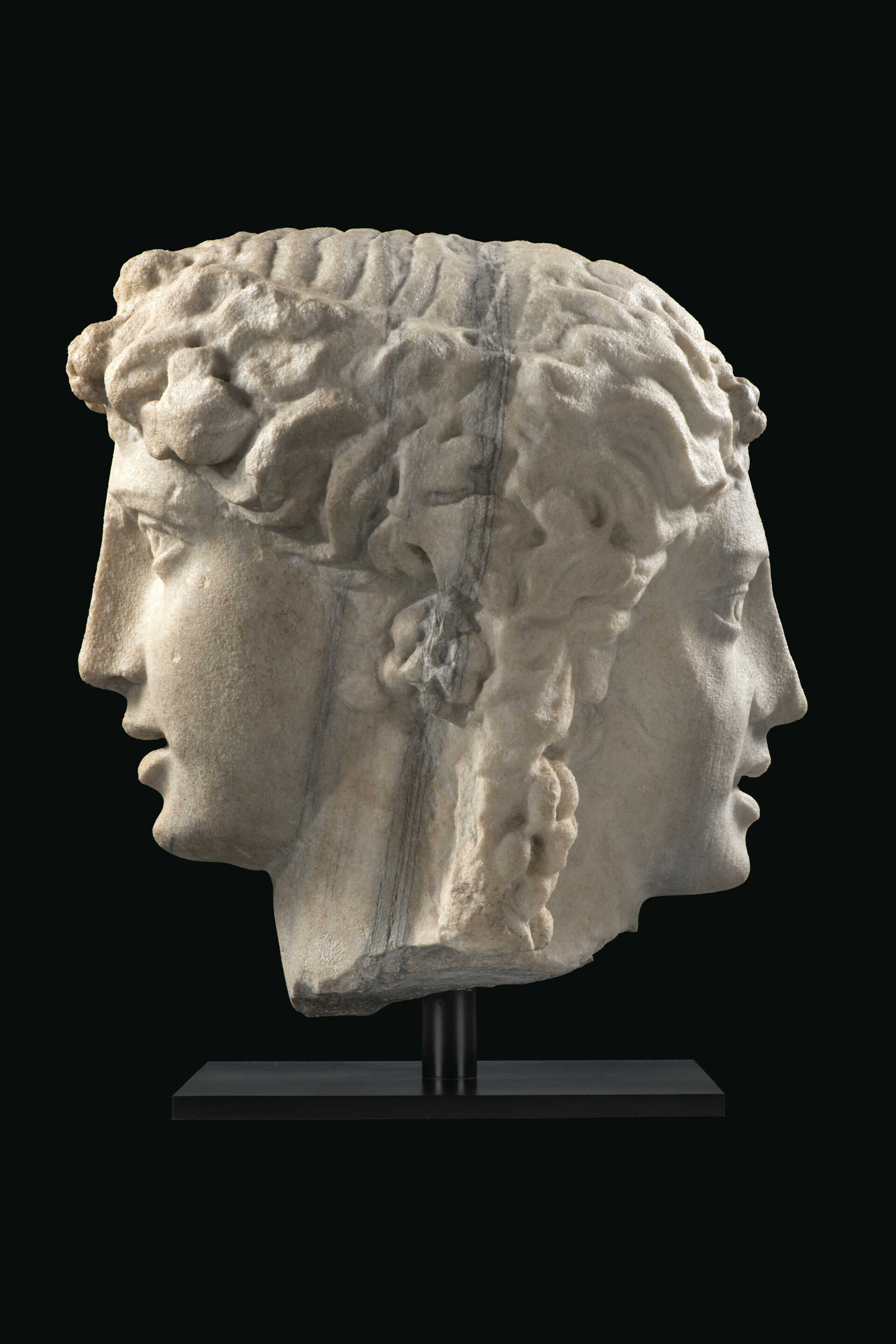 A MONUMENTAL ROMAN MARBLE JANIFORM HERM OF BACCHUS AND ARIADNE