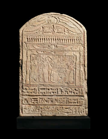 AN EGYPTIAN LIMESTONE ROUND-TOPPED STELE FOR IRET-HOR-RU - photo 1