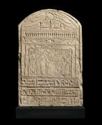 Известняк. AN EGYPTIAN LIMESTONE ROUND-TOPPED STELE FOR IRET-HOR-RU