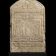 AN EGYPTIAN LIMESTONE ROUND-TOPPED STELE FOR IRET-HOR-RU - Now at the auction