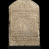 AN EGYPTIAN LIMESTONE ROUND-TOPPED STELE FOR IRET-HOR-RU - photo 1