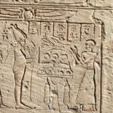 AN EGYPTIAN LIMESTONE ROUND-TOPPED STELE FOR IRET-HOR-RU - photo 6