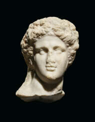 A ROMAN MARBLE HEAD OF BACCHUS